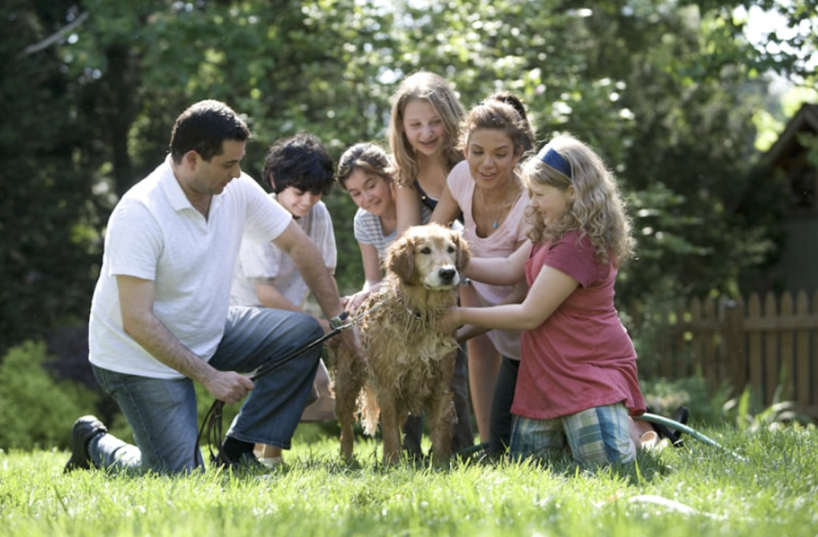 Family visiting elderly loved one